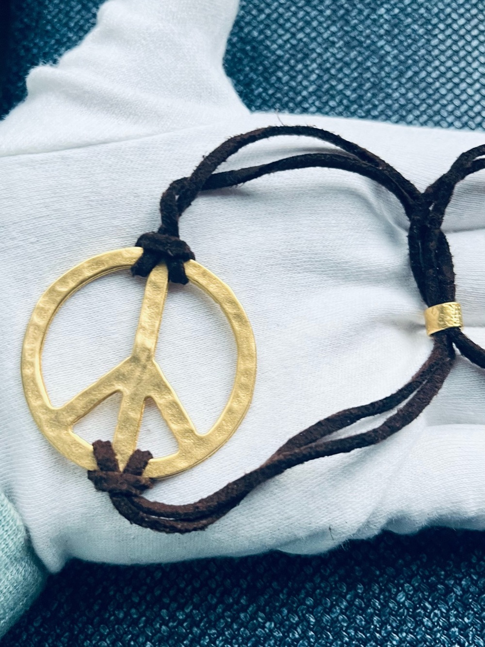 Gold tone Peace Sign Leather Cord Bracelet
